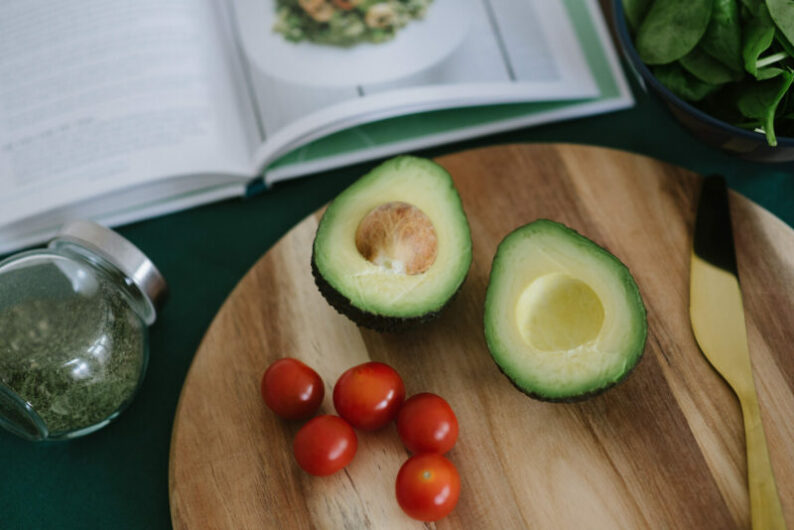 sliced avocado on a cuttng board