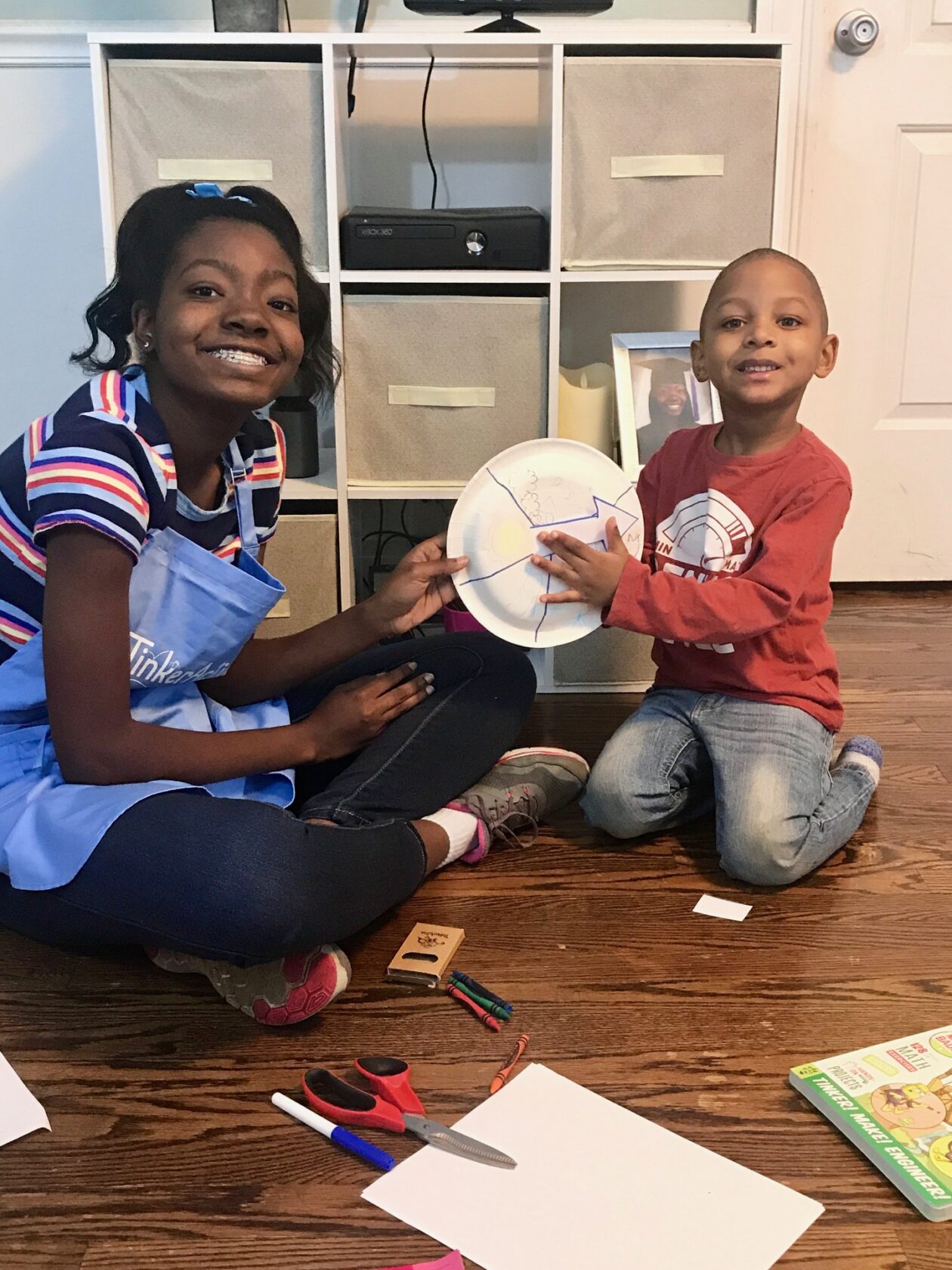 kids working on a weather wheel